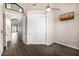 Bedroom with wooden floors and a closet, offering functionality and space at 7439 E Beryl Ave, Scottsdale, AZ 85258