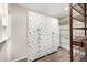 Walk-in closet with unique patterned storage and shelving at 7439 E Beryl Ave, Scottsdale, AZ 85258