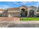 Beautiful home with a red tile roof, neutral stucco, desert landscaping, and an attached two-car garage at 7439 E Beryl Ave, Scottsdale, AZ 85258