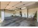 Clean, spacious garage with ample lighting, storage cabinets, and potential for various uses at 7439 E Beryl Ave, Scottsdale, AZ 85258