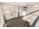 Open-concept living room with tile floors, high ceilings, and plenty of light at 7439 E Beryl Ave, Scottsdale, AZ 85258