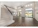 Open-concept home featuring a staircase and views of the backyard and pool at 7439 E Beryl Ave, Scottsdale, AZ 85258
