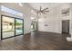 Large living room with patio access and tile floors with a view of the pool at 7439 E Beryl Ave, Scottsdale, AZ 85258