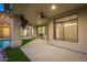 Covered patio with ample space, ceiling fan, and easy access to the pool at 7439 E Beryl Ave, Scottsdale, AZ 85258