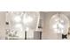 Close up of pendant lights in dining or living space at 7439 E Beryl Ave, Scottsdale, AZ 85258