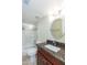 Bathroom featuring a granite countertop, a vessel sink and shower-over-tub with a mosaic tile accent at 7970 E Camelback Rd # 604, Scottsdale, AZ 85251