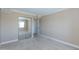 Bright bedroom with plush carpets and sliding mirrored closet doors, offering space and storage at 7970 E Camelback Rd # 604, Scottsdale, AZ 85251