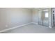 Neutral bedroom boasts plush carpeting, base molding, and mirrored closet doors for added space at 7970 E Camelback Rd # 604, Scottsdale, AZ 85251