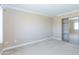 Neutral bedroom with plush carpets and closet with mirrored doors and built in shelving for storage at 7970 E Camelback Rd # 604, Scottsdale, AZ 85251