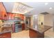 This updated kitchen features stainless steel appliances and granite countertops at 7970 E Camelback Rd # 604, Scottsdale, AZ 85251