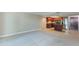 Open living space includes kitchen with stainless appliances, kitchen island, and wood cabinets at 7970 E Camelback Rd # 604, Scottsdale, AZ 85251