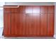 Spacious garage with wooden storage cabinets along the wall at 8214 N 16Th St, Phoenix, AZ 85020