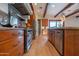 Kitchen featuring stainless steel appliances, custom cabinetry, stone countertops, and decorative tile backsplash at 8214 N 16Th St, Phoenix, AZ 85020