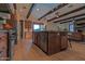 A large kitchen with an island, stainless steel appliances, and hardwood floors at 8214 N 16Th St, Phoenix, AZ 85020