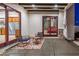Covered patio area with comfortable seating offering seamless indoor/outdoor living at 8214 N 16Th St, Phoenix, AZ 85020