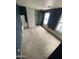 Bedroom with two windows and ample space for furniture at 9456 W Jamestown Rd, Phoenix, AZ 85037