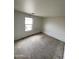 A small bedroom featuring a window for natural light at 9456 W Jamestown Rd, Phoenix, AZ 85037
