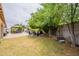 Grassy backyard has a built in outdoor kitchen and patio furniture at 10601 N 36Th St, Phoenix, AZ 85028
