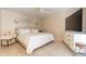 Cozy bedroom with tile floors, ceiling fan, and ample natural light at 10601 N 36Th St, Phoenix, AZ 85028