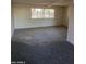 Open-concept living room with natural light at 1128 E Malibu E Dr, Tempe, AZ 85282