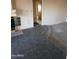 Spacious living room with decorative fireplace ready to customize with flooring and personal touches at 1128 E Malibu E Dr, Tempe, AZ 85282