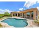 Private backyard featuring a pool, patio, and putting green at 11324 E Diamond Cholla Dr, Scottsdale, AZ 85255