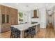 Open concept kitchen with a large center island, custom cabinets, and high-end stainless steel appliances at 11324 E Diamond Cholla Dr, Scottsdale, AZ 85255
