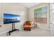 Sitting Room showcasing clean lines, modern entertainment center, and comfortable seating at 11324 E Diamond Cholla Dr, Scottsdale, AZ 85255
