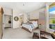 Spacious main bedroom with ensuite bathroom and views of the outside patio at 11324 E Diamond Cholla Dr, Scottsdale, AZ 85255