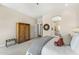 Spacious main bedroom with ensuite bathroom and carpet flooring at 11324 E Diamond Cholla Dr, Scottsdale, AZ 85255