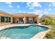 Gorgeous pool and patio area perfect for relaxing and entertaining, with views of the surrounding landscape at 11324 E Diamond Cholla Dr, Scottsdale, AZ 85255
