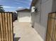 View of the backyard detached garage from behind a privacy fence at 12230 N 47Th Dr, Glendale, AZ 85304