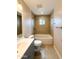 Well-lit bathroom features a tub, tiled shower, and modern vanity at 12230 N 47Th Dr, Glendale, AZ 85304