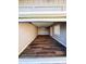 Spacious garage with wood-look flooring and recessed lighting offers ample storage and parking at 12230 N 47Th Dr, Glendale, AZ 85304