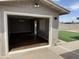View of a garage or shed, with finished floors and modern lighting at 12230 N 47Th Dr, Glendale, AZ 85304