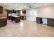 Open-concept kitchen boasting generous counter space, custom cabinets, and tiled floors at 12230 N 47Th Dr, Glendale, AZ 85304