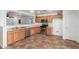 The spacious kitchen offers stainless steel appliances and ample countertop space for easy meal preparation at 12425 W Willow Ave Ave, El Mirage, AZ 85335