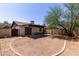 Spacious backyard featuring a patio, hammock, and lush tree, providing a tranquil outdoor retreat at 13041 N 51St Dr, Glendale, AZ 85304