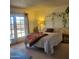 Relaxing bedroom with plants, bed and curtains at 13041 N 51St Dr, Glendale, AZ 85304