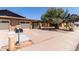 Lovely single-story home with brick accents, a two-car garage, and mature landscaping at 13041 N 51St Dr, Glendale, AZ 85304
