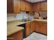 Classic kitchen with oak cabinets, laminate countertops, and stainless steel appliances at 13041 N 51St Dr, Glendale, AZ 85304