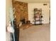 The fireplace is a focal point in the living room with a decorative book shelf at 13041 N 51St Dr, Glendale, AZ 85304