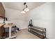 Functional office space with natural light, a work table, and ample room for storage at 13041 N 51St Dr, Glendale, AZ 85304