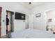 Well-lit bedroom features an ensuite bathroom, walk-in closet, and plush carpet at 1350 S Greenfield Rd # 1005, Mesa, AZ 85206