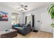 Bright living room boasts neutral colors, large windows, and a cozy seating area at 1350 S Greenfield Rd # 1005, Mesa, AZ 85206