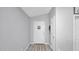 Bright entryway featuring a white door and light walls at 14952 W Maui Ln, Surprise, AZ 85379