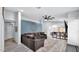 Spacious living room featuring modern décor, comfortable seating and an open layout at 14952 W Maui Ln, Surprise, AZ 85379