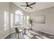 Bright breakfast nook with large window and views of outdoor landscape at 15411 W Amelia Dr, Goodyear, AZ 85395
