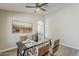 Dining room with a modern table set and shiplap wall at 15411 W Amelia Dr, Goodyear, AZ 85395