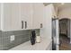 Close-up view of kitchen countertop and upper cabinets at 15411 W Amelia Dr, Goodyear, AZ 85395